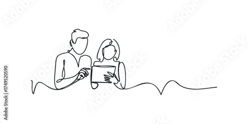 Two people are viewing a tablet together