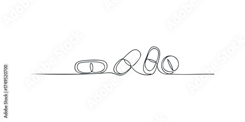 Line art drawing of pills on a white background
