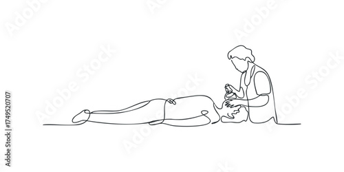 Two people performing a spa treatment with oil