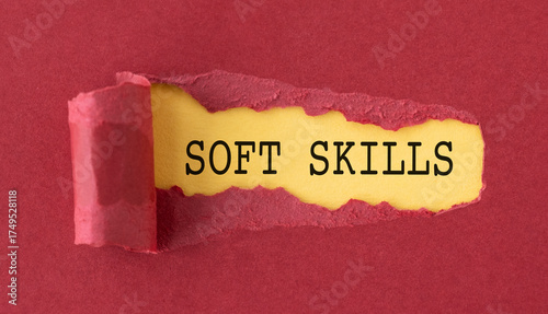 A torn piece of paper with the word Soft Skills written on it