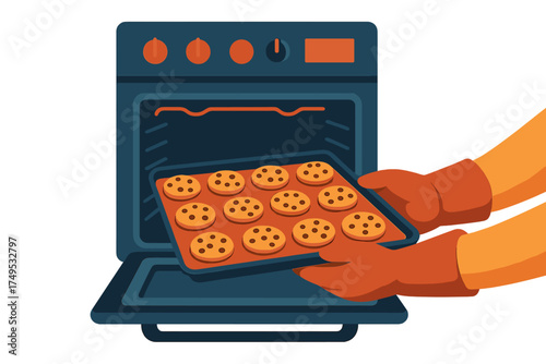 Hands carefully removing freshly baked chocolate chip cookies from hot oven