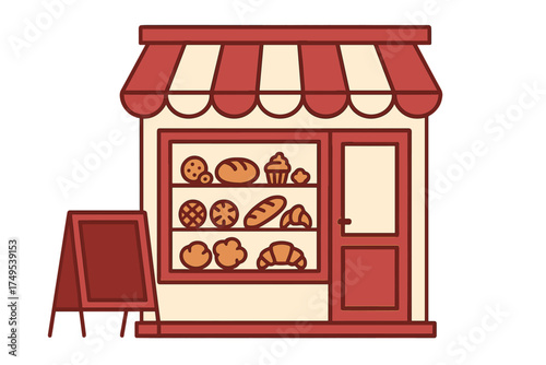 Small bakery shop facade with striped awning and window display of fresh bread and pastries