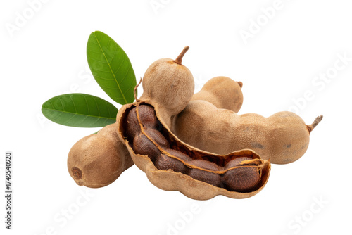 Fresh Tamarind Pods with Leaves isolated on a transparent background