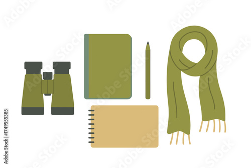 Flat lay of outdoor travel essentials including binoculars, notebooks, pencil, and warm scarf