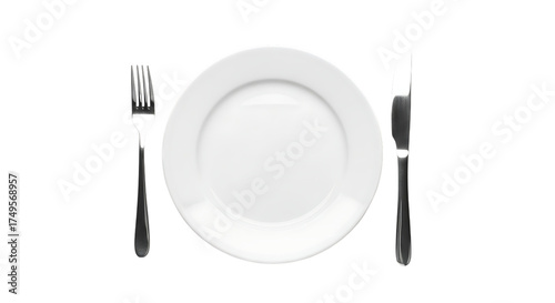 White plate with fork and knife silverware dining