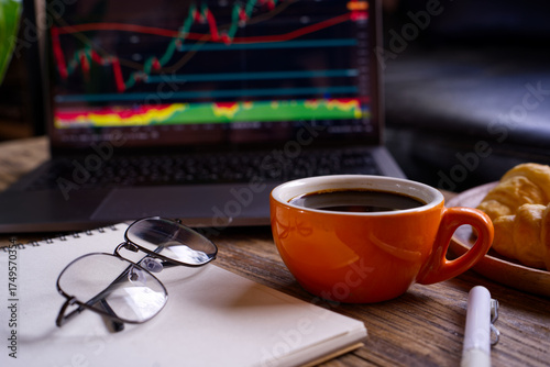 cup of coffee on the laptop
