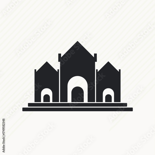 Isolated architectural symbol in silhouette against neutral backdrop shows building elevation. Isolated architectural form features archways and peaked roofs,