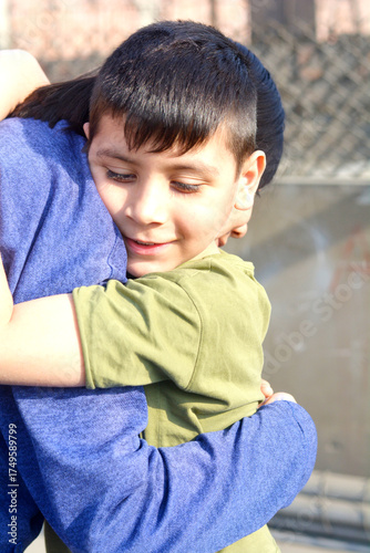Happy loving little latin siblings.
