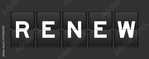 Black color analog flip board with word renew on gray background