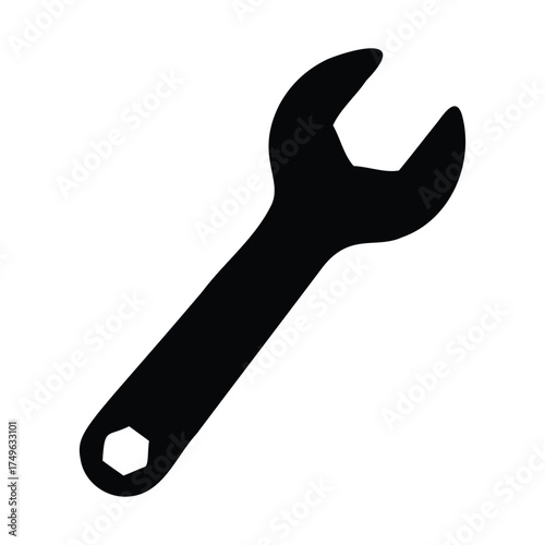 Black wrench tool with hexagonal opening and shadow