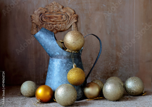 Old zinc jug and christmas balls 