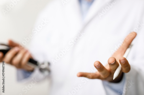 Doctor's hands with a steth...