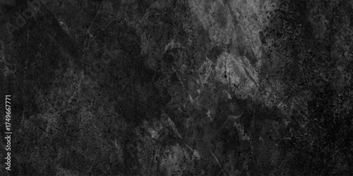 old black wall background texture, illuminated by sun ray close up of dark graphite surface for modern background, dirty dark raw cement wall texture and background, 