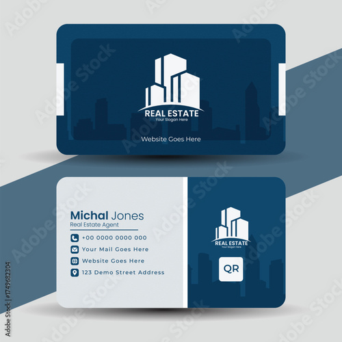 Stylish real estate business card template with building icon and modern color scheme