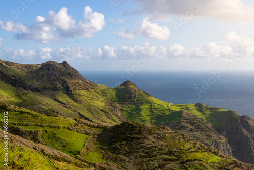 Epic coast with lush green meadows on Flores island, part of the Azores archipelago