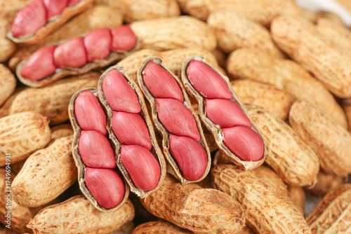 Fototapeta Fresh Red Coated Peanuts in Shell with Pink Skin - Specialty Groundnut Variety D