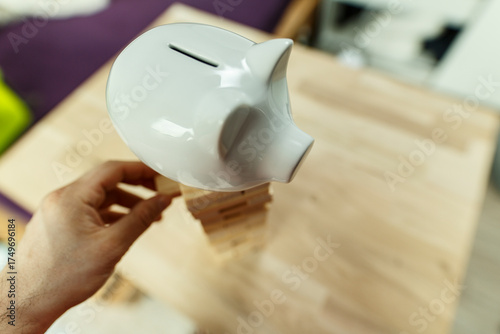 A hand carefully balancing ...