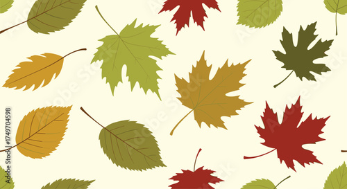 Seamless pattern of autumn leaves in various colors and shapes.
