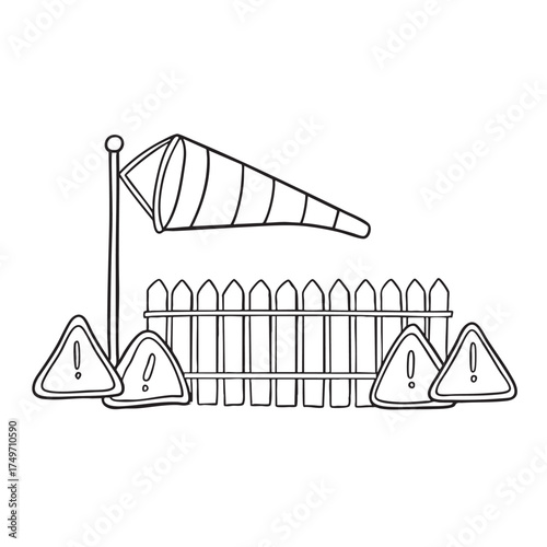 A windsock beside a fence lined with warning signs
