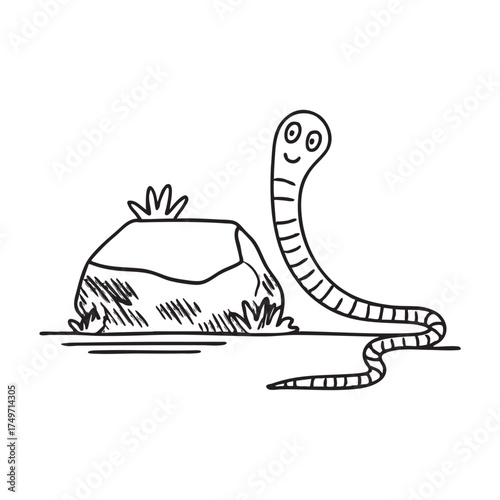 A worm near a stone with moss growing on it
