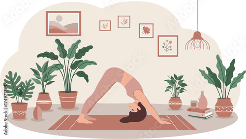 Woman in downward dog yoga pose in a room with plants and wall art