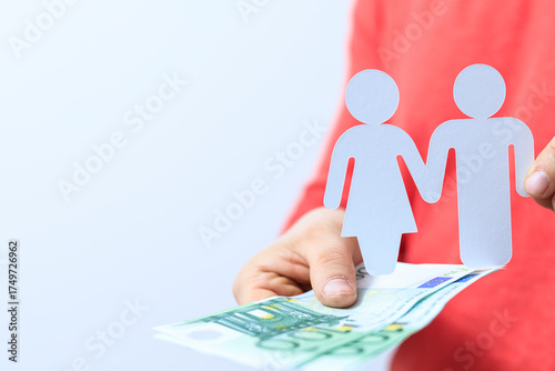 A person holds paper family...
