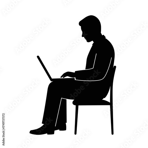 Man working on laptop while sitting on chair indoors - Concept of International Men's Day  