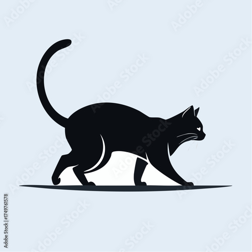 Black silhouette of a cat walking on a light blue background with a subtle shadow