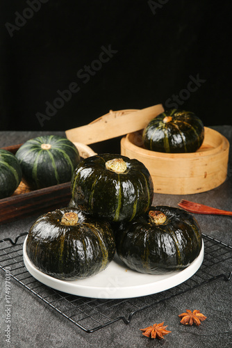 Fresh Small Dark Green Pumpkins from Shaanxi China with Traditional Bamboo Steamer and Star Anise Spices
