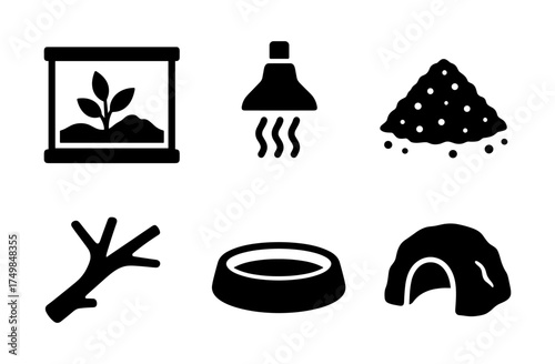 Reptile habitat essentials set: silhouette icons of terrarium, heat lamp, substrate, branch, bowl, and hideaway