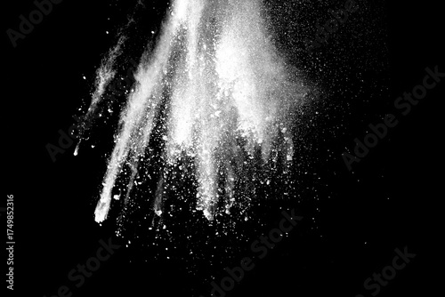 White powder explosion on black background.