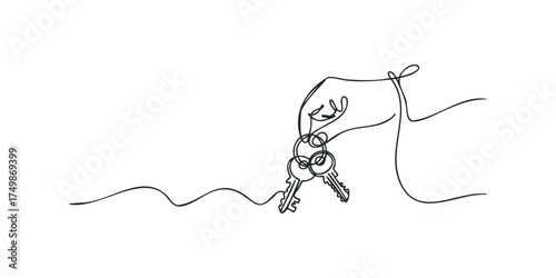 Hand holding multiple keys on a keyring