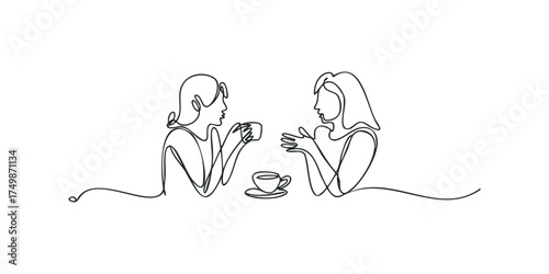Two women friends talking over coffee