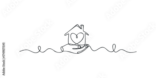 Hand holding house symbol with heart inside