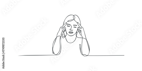 Woman holding head in concentration