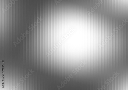 Abstract grayscale background with blurred light and vertical lines creating a futuristic and modern texture