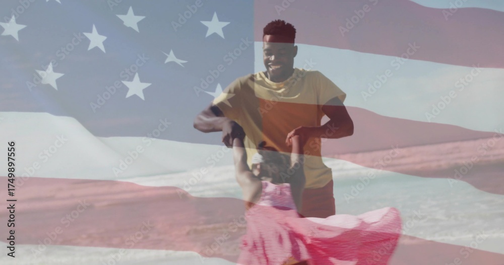 Naklejka premium Spinning father and daughter holding hands at beach with waves, translucent stars stripes overlay