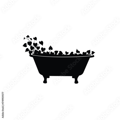 Bathtub filled with heart shaped leaves silhouette
