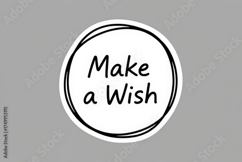 “Make a Wish” written in elegant script inside a hand-drawn circle on a soft gray background — simple, inspiring, and perfect for motivational or dream-themed designs.