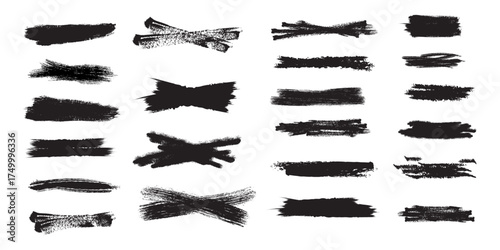 Collection of diverse black ink brush stroke textures and abstract paint splatters on a white background for graphic design