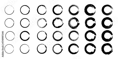 Abstract black and white oval shapes with distressed textures arranged in a grid pattern for graphic design elements