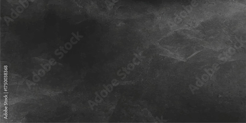 Dark and dirty vintage blackboard wall texture featuring a blank abstract grunge design with subtle white chalk dust pattern