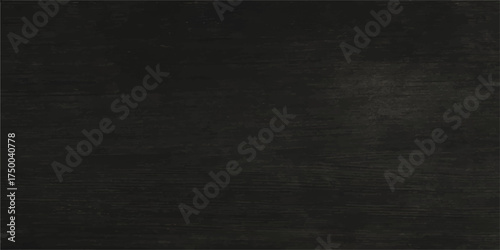 The dark, grunge blackboard background texture with an old and rough canvas surface offers a blank vintage backdrop for your design