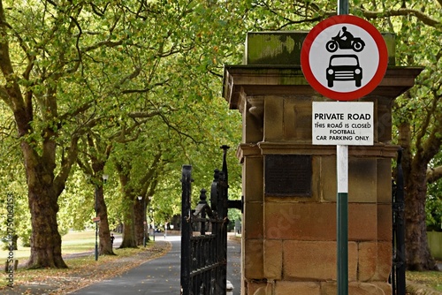 Road sign UK. Motorbike over a car. No motor vehicles. Private Road. This Road is Closed. Football Car Parking Only.