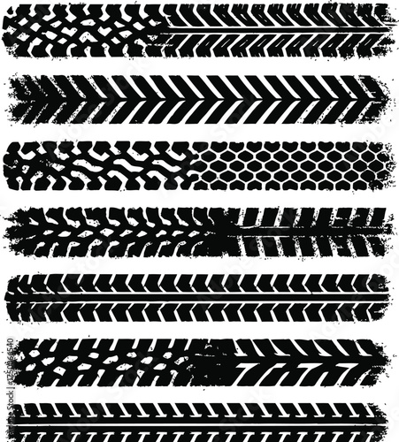 A set of black and white grunge tire tracks, wheel braking marks. Truck, car or motorcycle tread pattern silhouette.