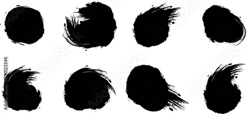 Collection of eight black ink brush stroke circles and splatters, isolated on transparent background, abstract artistic elements for design