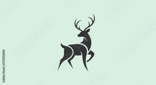 Elegant Black Deer Silhouette with Majestic Antlers Standing Gracefully.