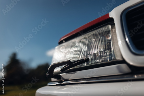 Close-up of headlight wiper on vintage car