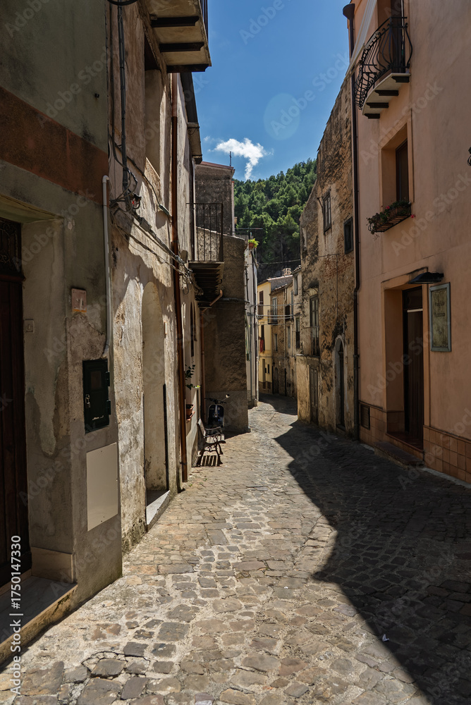 Obraz premium Gratteri historic medieval Sicilian mountain village town with stone buildings in summer surrounded by Madonie Natural Park forest near Cefalu bay Sicily island southern Italy Europe