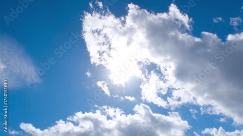 Timelapse of Sun Shining Through Clouds in Blue Sky. Sun Rays Breaking Through Moving Clouds – Sky Timelapse. Time Lapse of Cloudy Sky with Sunlight.